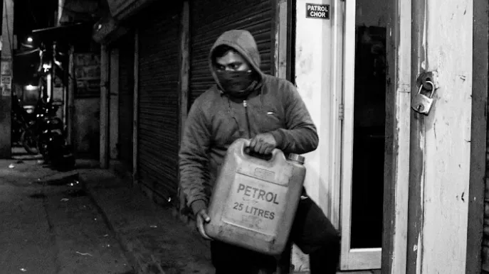 Thief steals petrol, leaves valuables behind